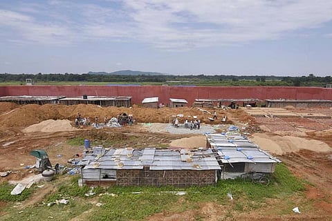 Labourers construct a detention centre for illegal immigrants in Goalpara, Assam