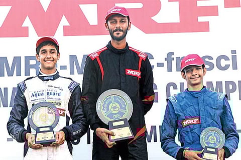 Winner Raghul Rangasamy (centre) is flanked by second-placed Yash Aradhya (left) and Sohil Shah