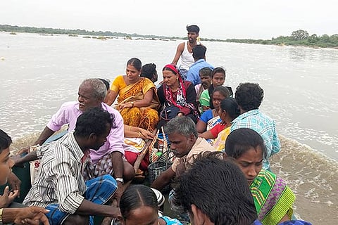 People being ferried from Mela Ramanallur in Ariyalur