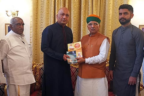 Union Minister of State Ram Meghwal presenting a book to the Nawabzada at Amir Mahal on Sunday