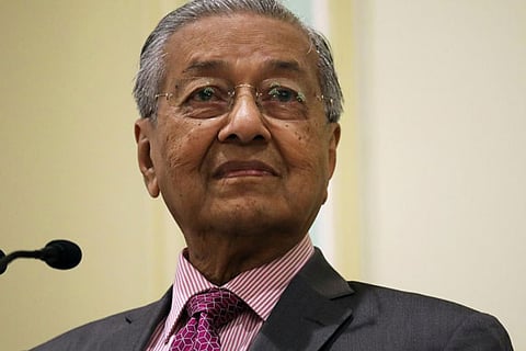 Malaysia PM says can't provoke Beijing on South China Sea, Uighur issue