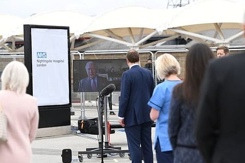 Britain's Prince Charles opens massive new field new hospital to fight coronavirus