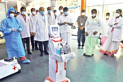 A robotic nurse serves food, medicines to patients during an inspection by Health Minister