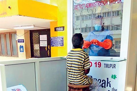 Medical staff collect samples at the newly opened kiosk in Tirupur government hospital