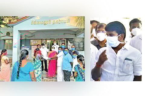 DMK and AIADMK cadre together distribute relief materials to the needy at Chinamannur in Theni dist