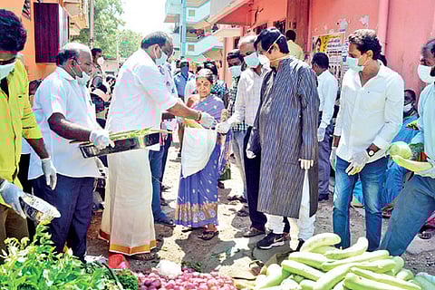 NGO members giving away essentials (file pic)