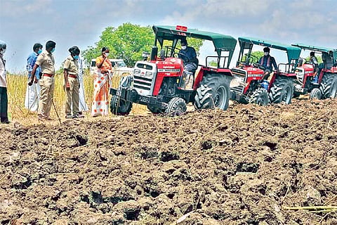 TAFE tractors till fields at Melathulukkankulam village in Virudhunagar during launch of the service