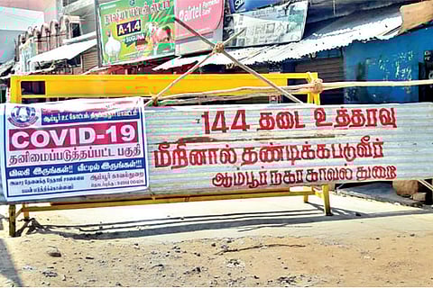 A street barricaded to prevent residents from stepping out, in Ambur on Sunday