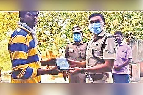 SP Aravindhan hands over compensation to the farmer