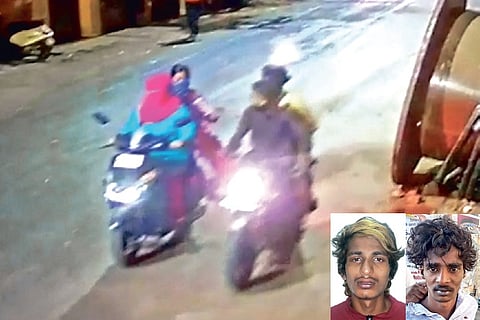 The bike-borne duo snatch the handbag of a pillion rider