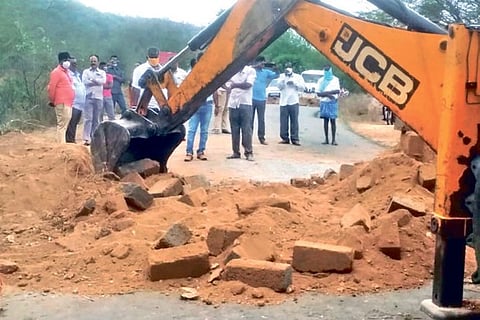 One of the walls being demolished