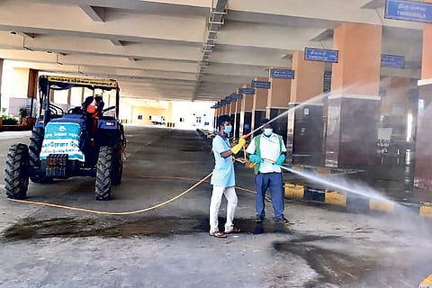Disinfecting Madhavaram bus terminus for shifting a section of traders from Koyambedu market