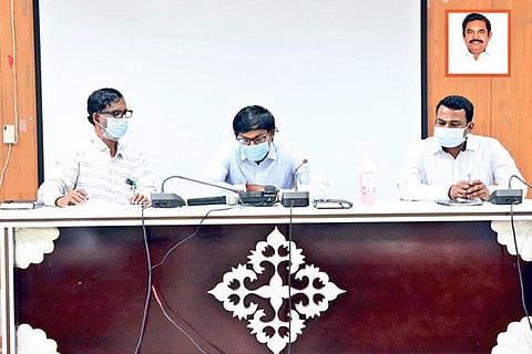 Tirupur Collector K Vijayakarthikeyan listening to grievances over phone at the Collectorate