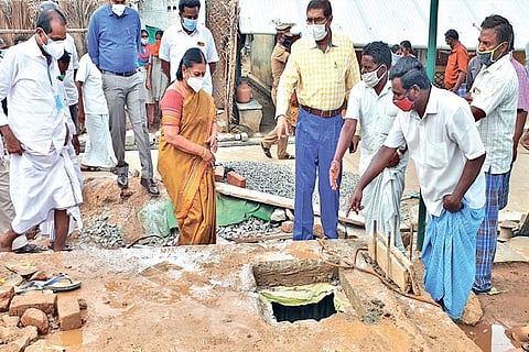 Social Welfare Minister V Saroja inspects the water tank in which the workers died in Namakkal