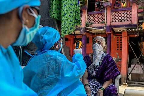 Health officials screened residents of the Koliwada neighborhood of Mumbai