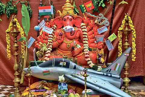 A 5ft tall Vinayagar seen perched on a recently acquired fighter aircraft Rafale from France