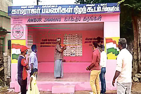 An ex-serviceman inaugurating the bus shelter at Chinnavarigam village near Ambur renovated