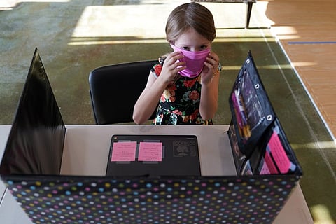 The first grader will attend her classes virtually while spending her days at the martial artsstudio