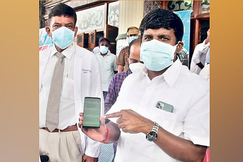 Health Minister C Vijaya Baskar explaining the automated response system