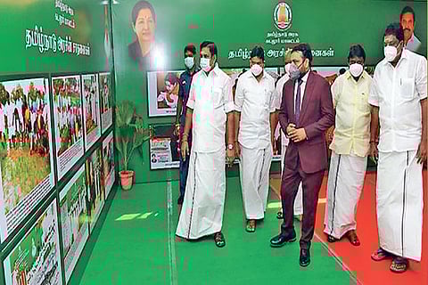 Chief Minister takes a look at the photo expo of govt schemes organised by Public Relations Dept