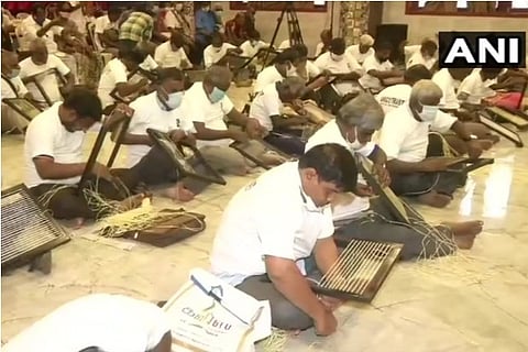 Visually challenged people attempt a world record by weaving 50 chairs in 6 hours
