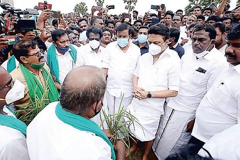 DMK president MK Stalin taking stock of flood situation in Nagapattinam on Sunday.