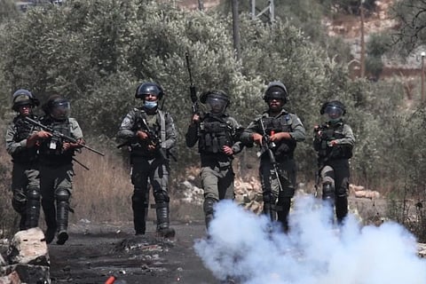 PLO accuses Israel of expanding West Bank settlements