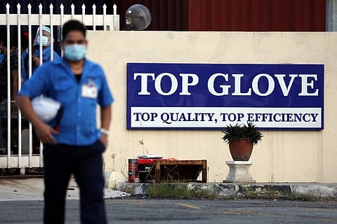 Malaysia's Top Glove reports worker death due to COVID-19, first since outbreak at firm