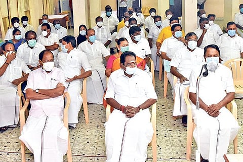 AIADMK office-bearers at the meeting held at the party HQ in Chennai on Monday