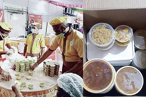 Sastha Catering Services staff packing dishes for delivery.