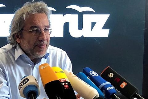 Turkish journalist gets 27 years in absentia for espionage