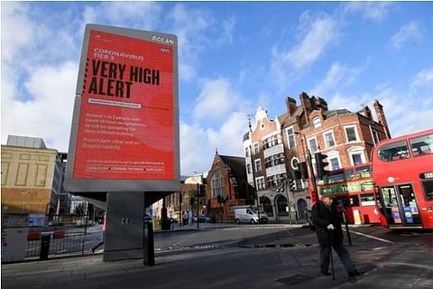 Millions face new UK virus restrictions, border chaos eases