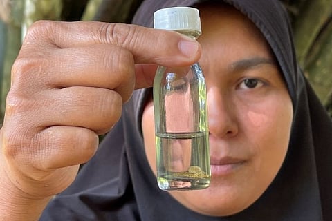 Thai women gold panners are rare winners in COVID-hit economy