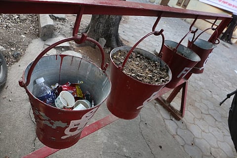 Sand buckets with garbage at Collector?s office