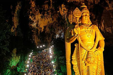 Devotees climb the steps to Batu Caves during Thaipoosam festival in Kuala Lumpur