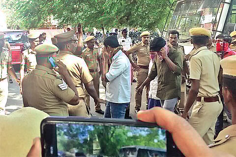 Sexual assault convicts arrive in a court under tight security on Monday