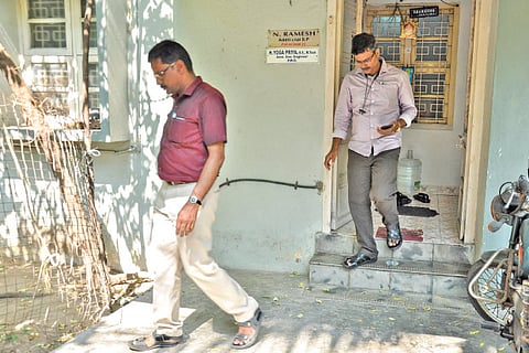 Members of the raid team at the residence of a senior police officer in Chennai on Saturday