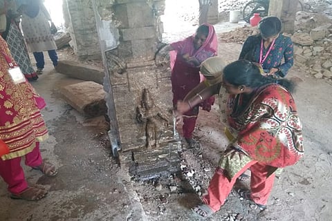 DKM college history students engaged in cleaning the statue adorned pillars inside Vellore fort