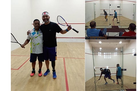 Dipak Nambiar (right) in action during the Century Bangalore Squash Open