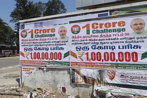 The poster showing the ?Rs 1 crore challenge? in different parts of Chennai