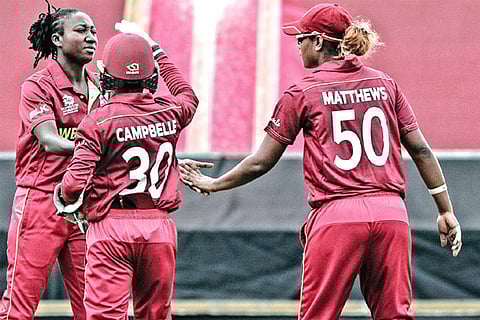 West Indies players celebrate the wicket of a Thailand batswoman on Saturday