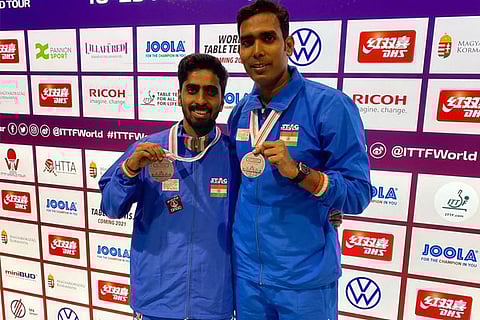 Sathiyan (left) with Sharath