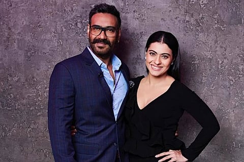 Kajol tutors Ajay on how to click selfies