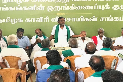Farmers hold a protest meet at Mannargudi, Tiruvarur, on Tuesday