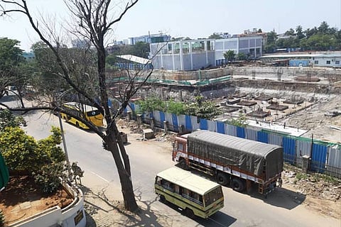 Illegal parking takes up most of the space, making pedestrians to walk on the middle of the road