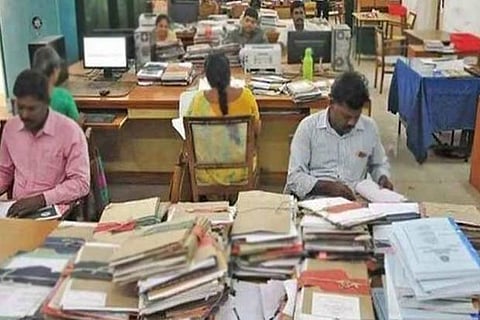 Wear photo ID at work or face action, govt warns staff 