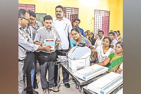Teachers taking training in poll duty (File photo)