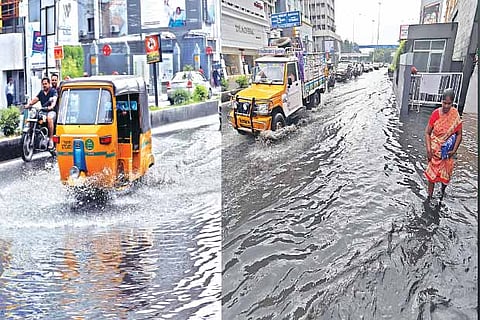 Motorists and pedestrians work their way through a flooded road near Gemini flyover on Wednesday