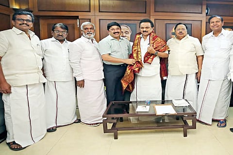 Senior functionaries greeting DMK president Stalin after the poll victory