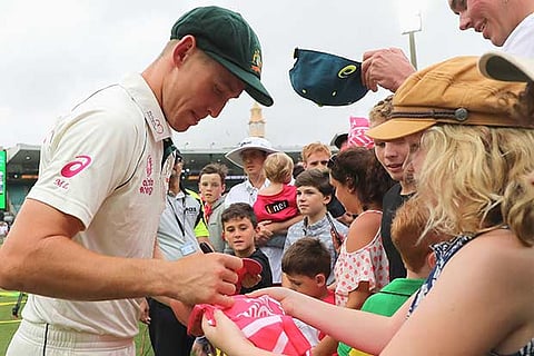 Marnus Labuschagne signs autographs after Australia won the third Test